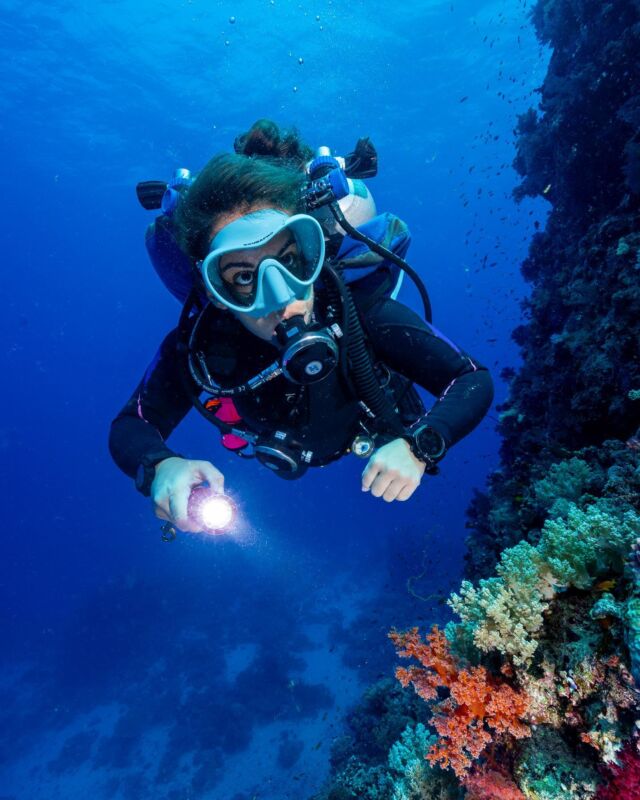 Female Presenter is Diving with Neoprene Wetsuit and Mantis Full